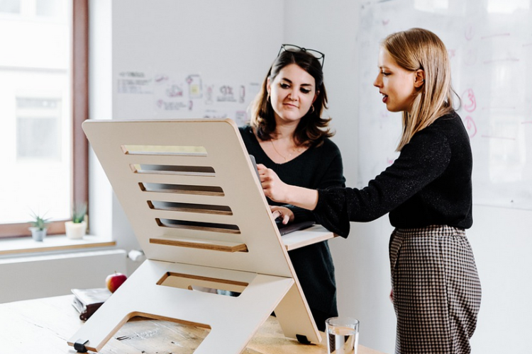 two workers standing